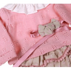 Różowy sweterek ze...